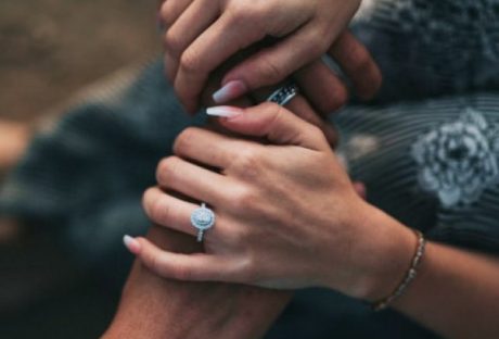 Engagement rings symbolize love's promise.
